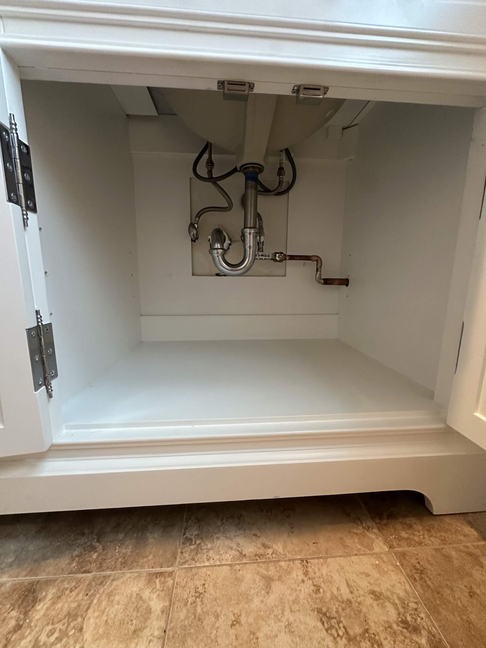 New bathroom vanity drain and supply lines.